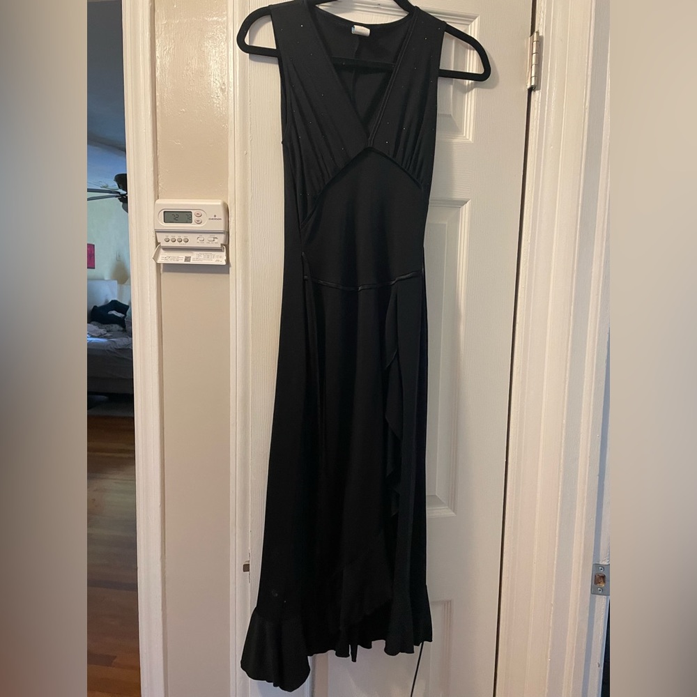 Has ties to make tighter in waist.   Never worn.  Size small.
